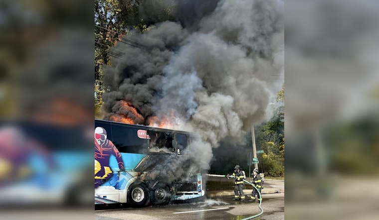 UMass Lowell Marching Band Bus Engulfed in Flames as Students Evacuate Safely in Westwood Emergency