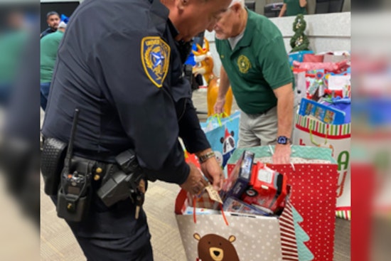 Universal City Embraces Holiday Spirit with Blue Santa Program for Underserved Children