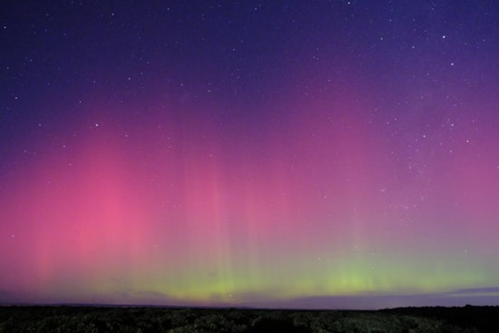 Arizona Skies Dazzle with Rare Northern Lights Spectacle, Photographers Gear Up for Second Night of Celestial Show