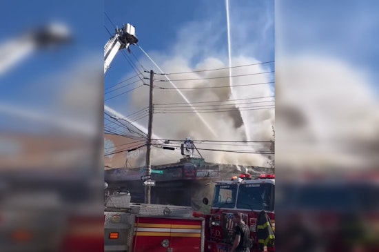 Bronx Blaze at Auto Shop Injures Firefighters, Displaces Families, and Sparks Investigation