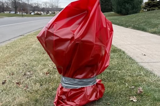 Coon Rapids Fire Hydrants Don Red Bags to Keep Road Salt at Bay During Winter Season