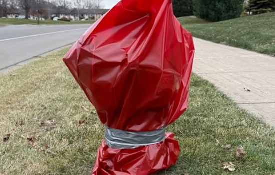 Coon Rapids Fire Hydrants Don Red Bags to Keep Road Salt at Bay During Winter Season