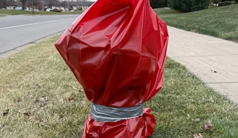 Coon Rapids Fire Hydrants Don Red Bags to Keep Road Salt at Bay During Winter Season