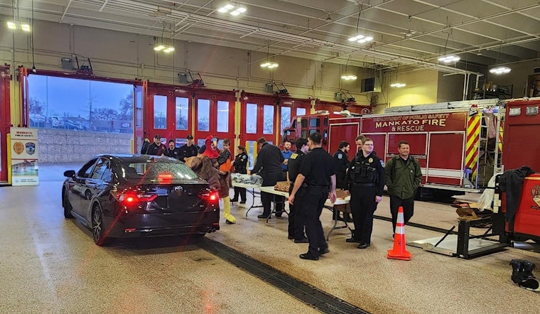 Mankato Police, Fire Departments, and Local Partners Distribute Holiday Meal Kits to 100 Families in Need