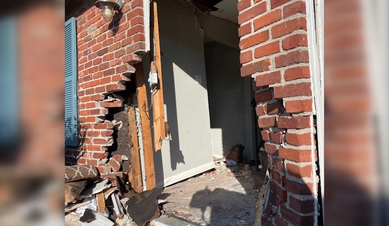 No Injuries Reported as Car Slams into Speedway Apartment Building, Prompting Swift Response from Fire Department