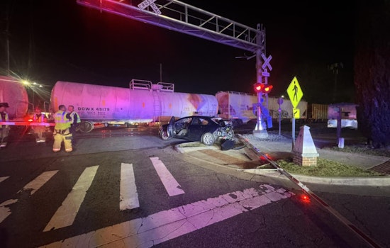 No Injuries Reported as Train Clips Car Near Marietta Square, Disrupting Traffic on Waverly Way