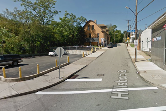 Pittsburgh's Sheraden Neighborhood Reels from Auto Garage Fire, One Man Missing amid Emergency Response