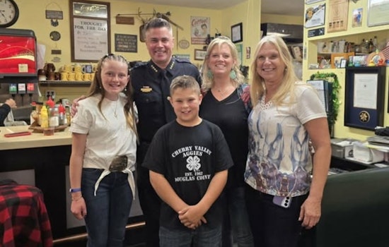 Sedalia's O'Brien's Café Owner Donna O'Brien Serves Thanksgiving Meals to Douglas County Sheriff's Deputies and Families