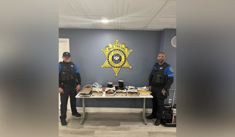St. John the Baptist Parish Deputies Receive Thanksgiving Feast from Grateful Local Family