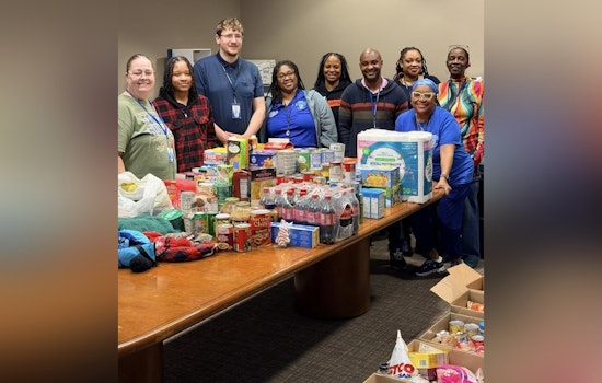 St. Louis Police Dept's Telephone Reporting Unit Garners Praise for Holiday Food Donation to Local School