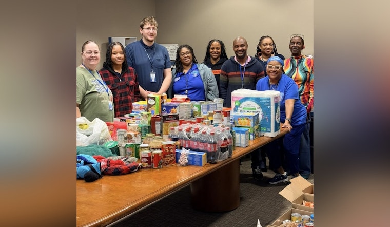 St. Louis Police Dept's Telephone Reporting Unit Garners Praise for Holiday Food Donation to Local School