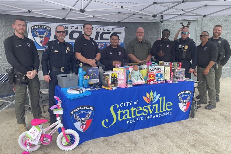 Statesville Police Department Champions Holiday Giving with "Fill the Trailer Toy Drive" Event at Walmart
