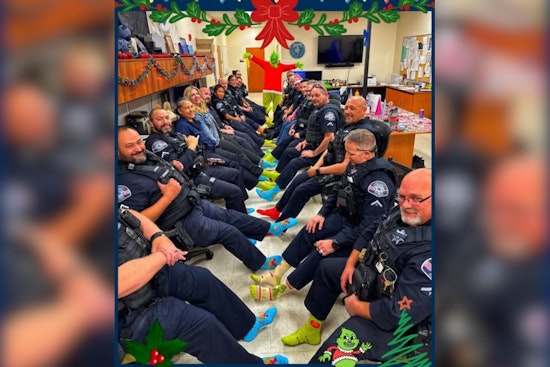Adams County Sheriff's Deputies Bring Holiday Cheer with Grinch Socks at Colorado Courthouse