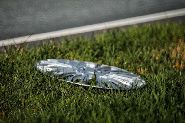 Baltimore Cyclist Creates Urban Art Gallery with Over 700 Upcycled Hubcaps
