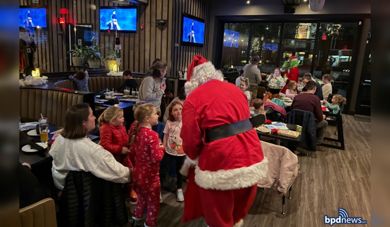 Boston Police Spread Holiday Cheer at West Roxbury YMCA's "Polar Express" Night
