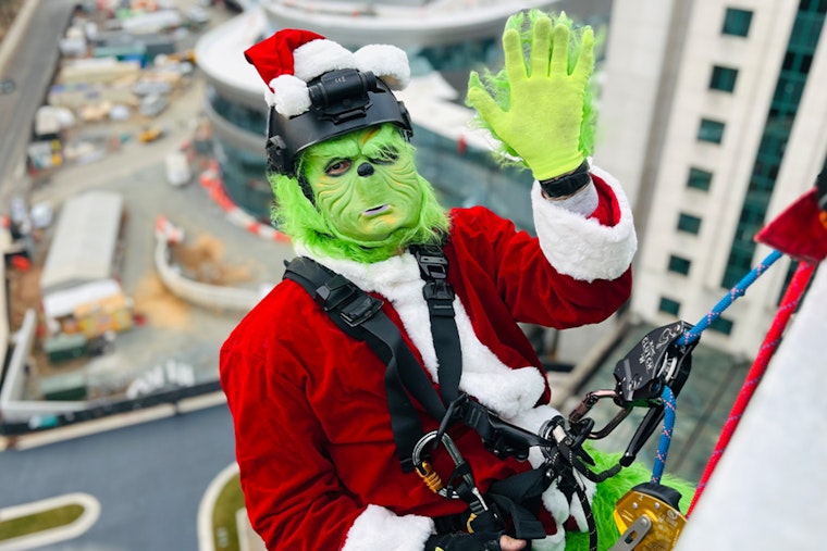 Charlotte Firefighters Don Santa Hats and Rappel Levine Children's Hospital to Brighten Holidays for Young Patients