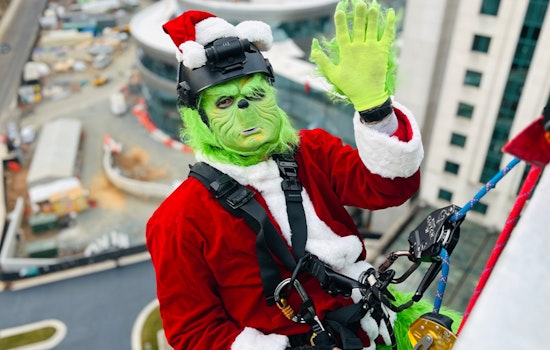 Charlotte Firefighters Don Santa Hats and Rappel Levine Children's Hospital to Brighten Holidays for Young Patients