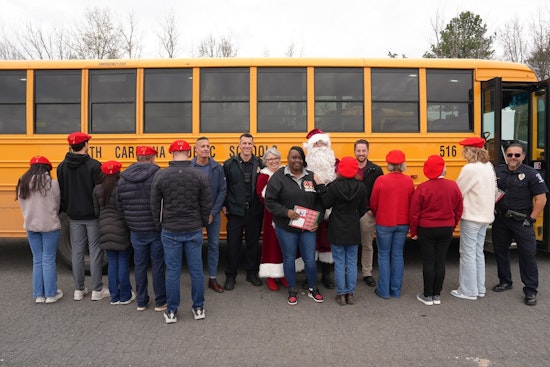 Charlotte Police Spread Holiday Cheer by Distributing $100 Bills to Residents in Secret Santa Tradition