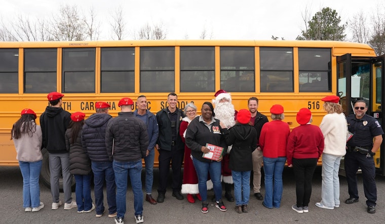 Charlotte Police Spread Holiday Cheer by Distributing $100 Bills to Residents in Secret Santa Tradition