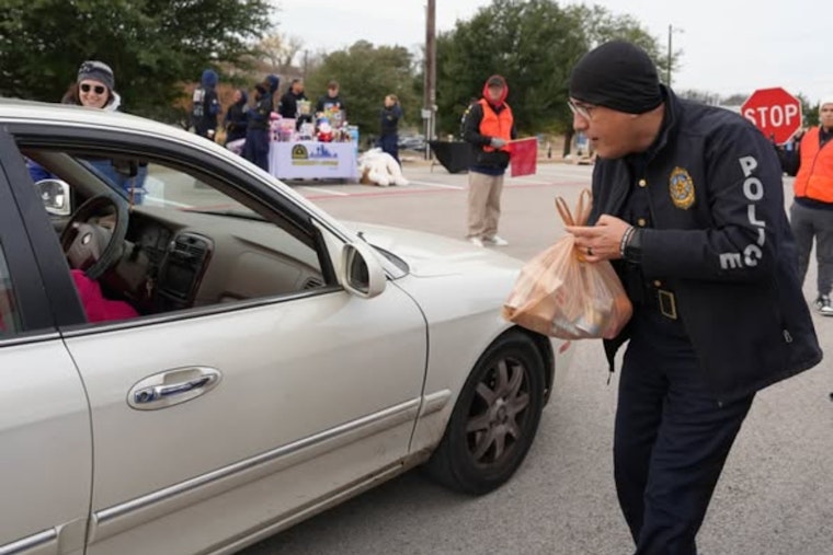 Dallas Police Department's 6th Annual Food Giveaway Spreads Holiday Cheer to Over 1,500 Families at Paul Quinn College
