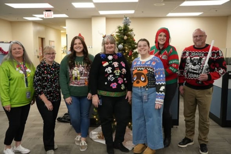 Douglas County Sheriff's Office Records Department Celebrates Festive Camaraderie with Ugly Christmas Sweater Contest
