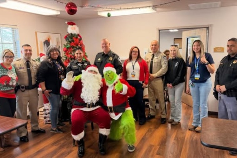 El Paso County Sheriff's Office Delivers Holiday Joy to Seniors with Santa and the Grinch at St. Teresa Center