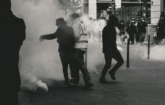Federal Agents Use Tear Gas in Standoff with Crowd During Immigration Operation in Elgin