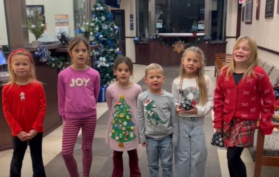 VIDEO: Highlands Ranch Substation Warmed by Surprise Christmas Visit and Caroling From Local Families