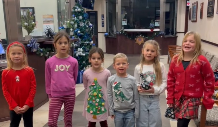 VIDEO: Highlands Ranch Substation Warmed by Surprise Christmas Visit and Caroling From Local Families