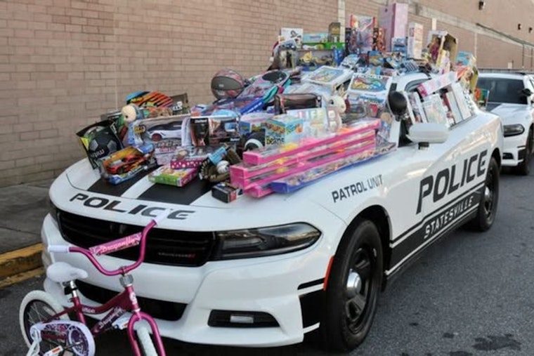 Join Statesville Police Department's Fill the Trailer Toy Drive at Walmart on December 6