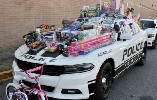 Join Statesville Police Department's Fill the Trailer Toy Drive at Walmart on December 6