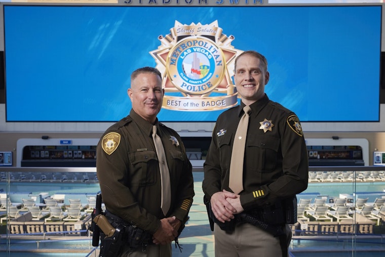 Las Vegas Cops Lean Over Third-Floor Ledge in Daring Rescue