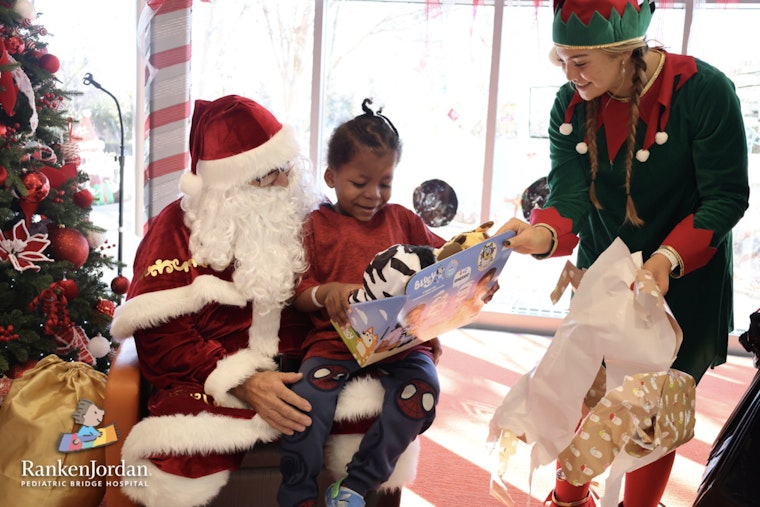 Maryland Heights Police and Firefighters Deliver Holiday Cheer to Pediatric Patients