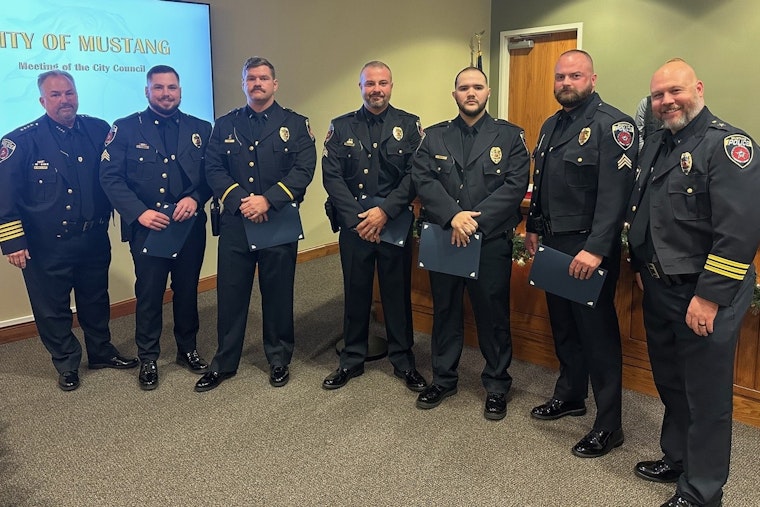 Mustang Police Officers Honored with Medal for Meritorious Service Following Heroic Fire Rescue Efforts