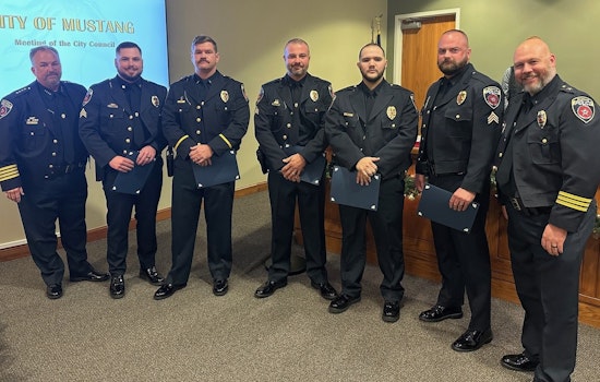 Mustang Police Officers Honored with Medal for Meritorious Service Following Heroic Fire Rescue Efforts