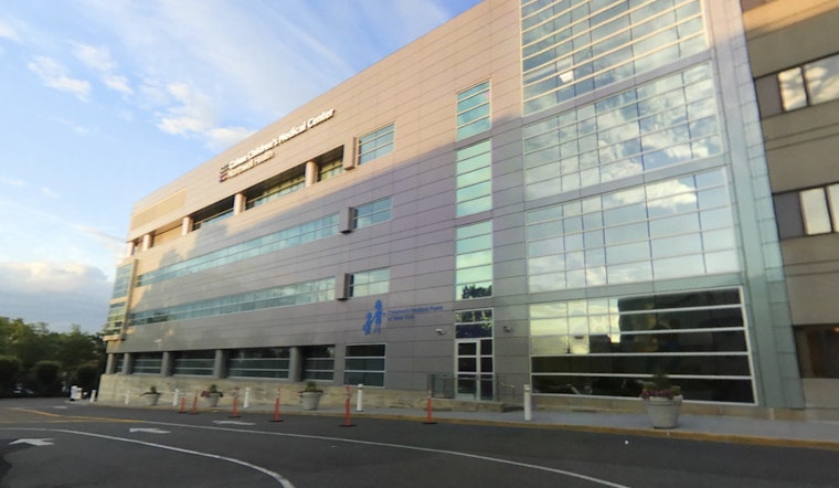 Nassau County Police and NYPD Spread Holiday Joy to Children's Hospitals on Long Island and Queens