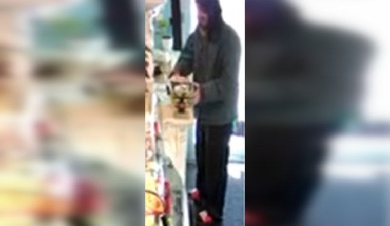 New Orleans Police Seek Public's Assistance in Identifying Tattooed Suspect in Canal Street Theft