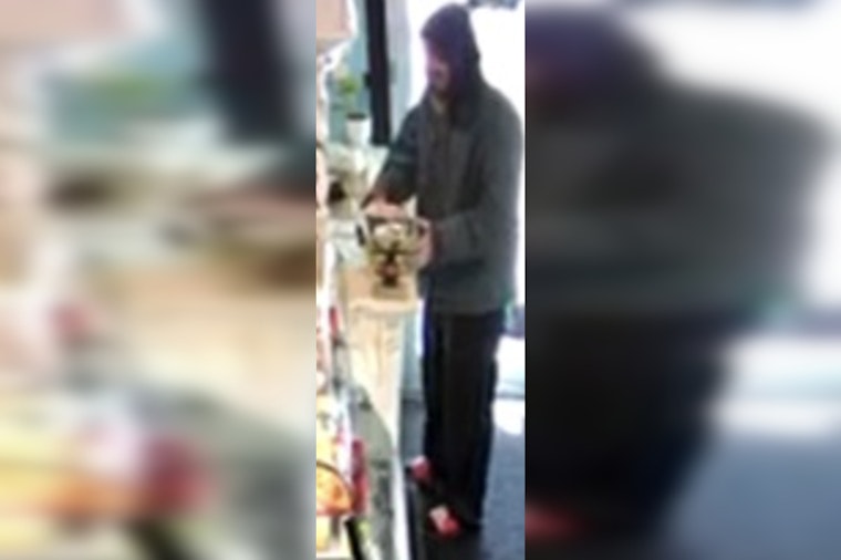 New Orleans Police Seek Public's Help to Identify Tattooed Suspect in Canal Street Cash Theft