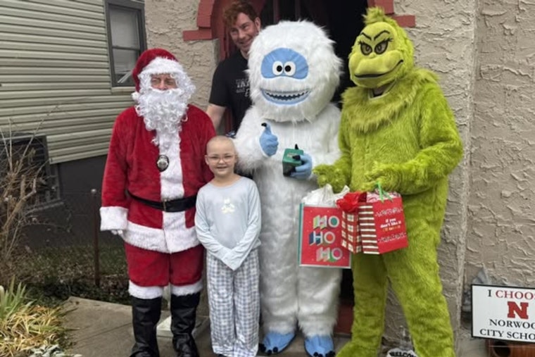 Norwood Police Officers Deliver Holiday Cheer with Christmas Presents to Local Community