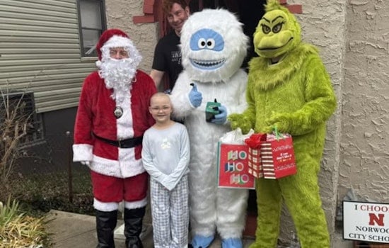 Norwood Police Officers Deliver Holiday Cheer with Christmas Presents to Local Community