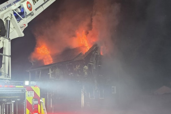 Resident and Firefighter Injured as Fire Rages Through New Bedford Home, Investigation Underway