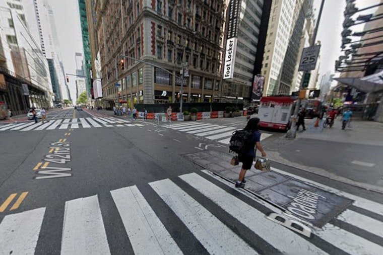 Taxi Suspended Above Manhole in Times Square, No Injuries Reported