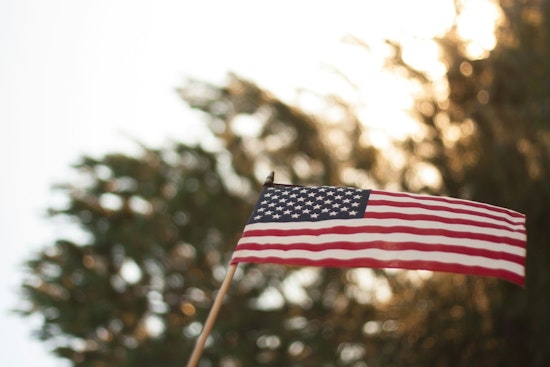 Tears, Pride and Tiny Flags as 91 New Americans Take Oath at South Side Museum