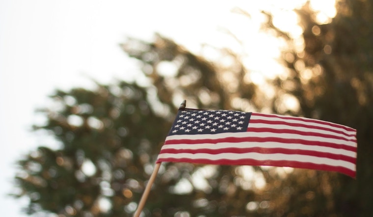 Tears, Pride and Tiny Flags as 91 New Americans Take Oath at South Side Museum