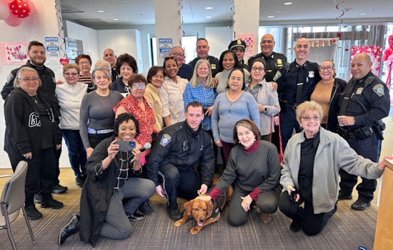 Boston Police and Comfort Dog Copper Connect with Locals at "Coffee with a Cop" Event in East Boston