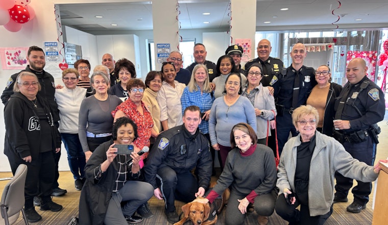 Boston Police and Comfort Dog Copper Connect with Locals at "Coffee with a Cop" Event in East Boston