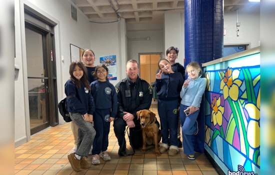 Boston Police Comfort Dog Copper Charms Kids at East Boston's Salesian Boys & Girls Club