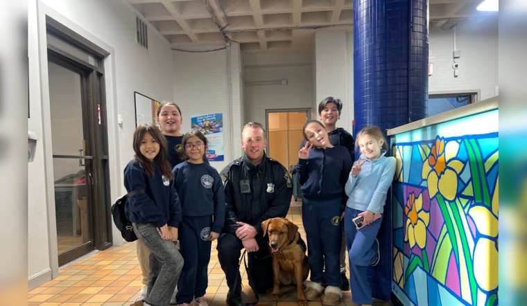 Boston Police Comfort Dog Copper Charms Kids at East Boston's Salesian Boys & Girls Club