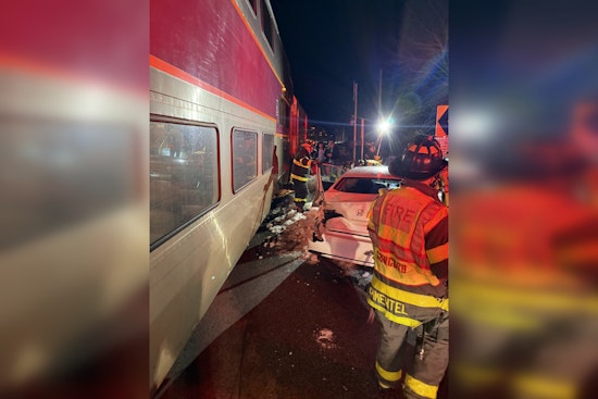 Commuter Train Strikes Car on Tracks in Concord MA as Driver Sustains Minor Injuries and Investigation Underway