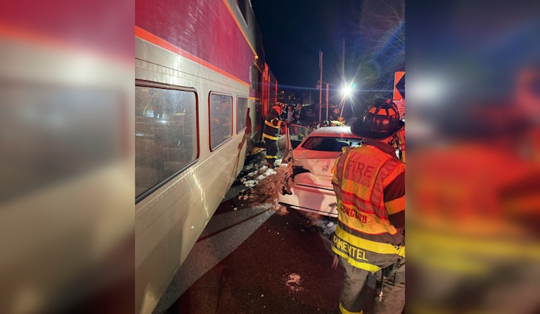Commuter Train Strikes Car on Tracks in Concord MA as Driver Sustains Minor Injuries and Investigation Underway